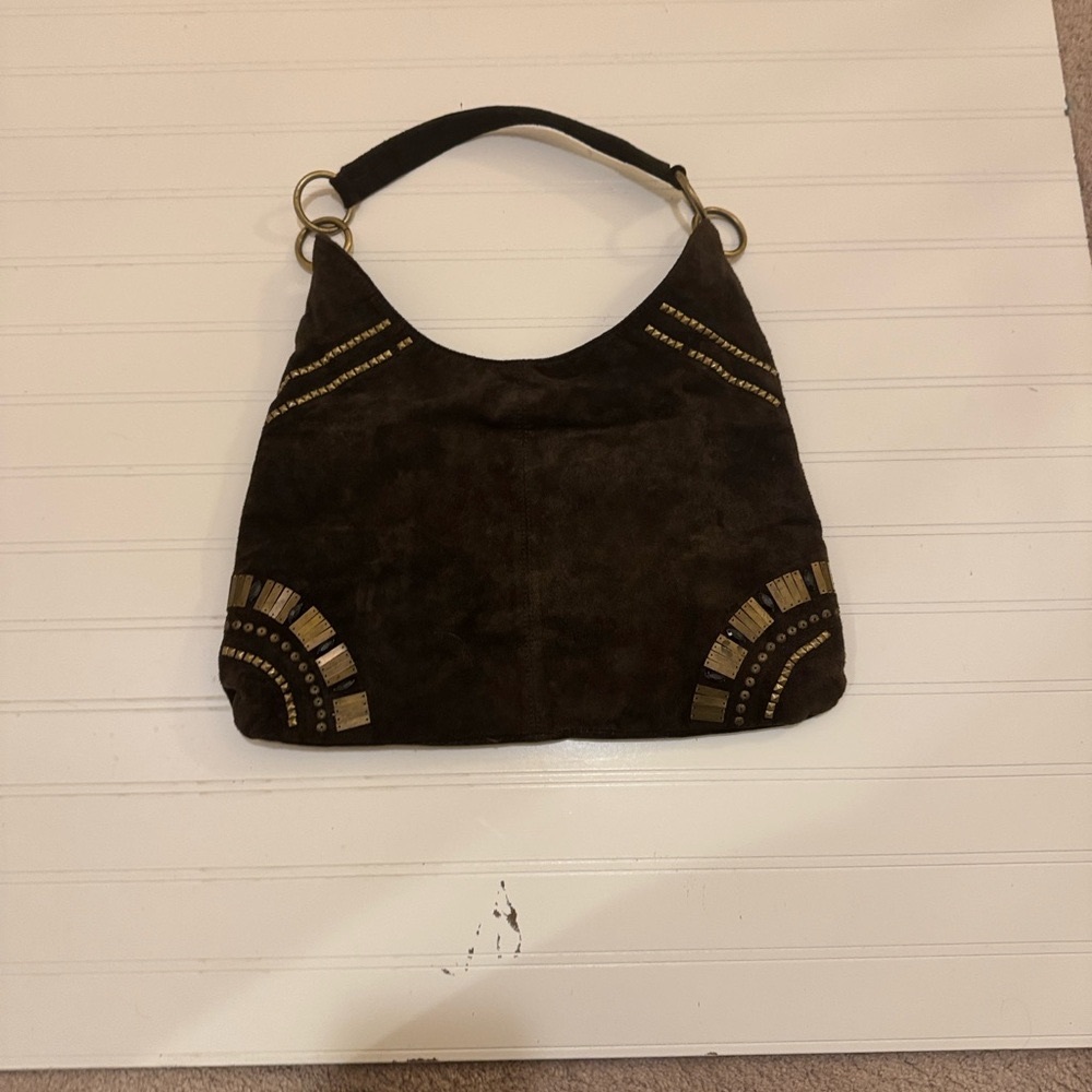 Vintage “The Limited” brown leather bag with brass accents.